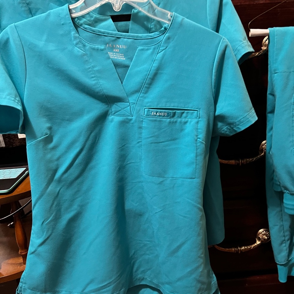 2 sets of Teal blue JAANU Scrubs